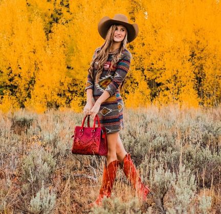 Audrey wearing a long-sleeved dress with a bold geometric print