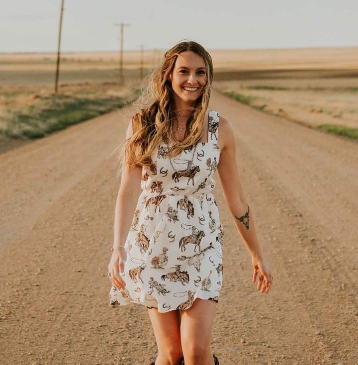 Girl wearing a breezy white dress