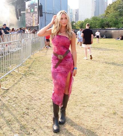 Katie wearing a vibrant pink tie-dye dress