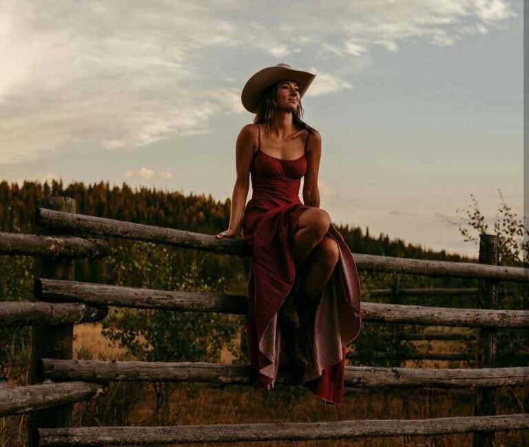 girl wearing a flowy dark red maxi dress