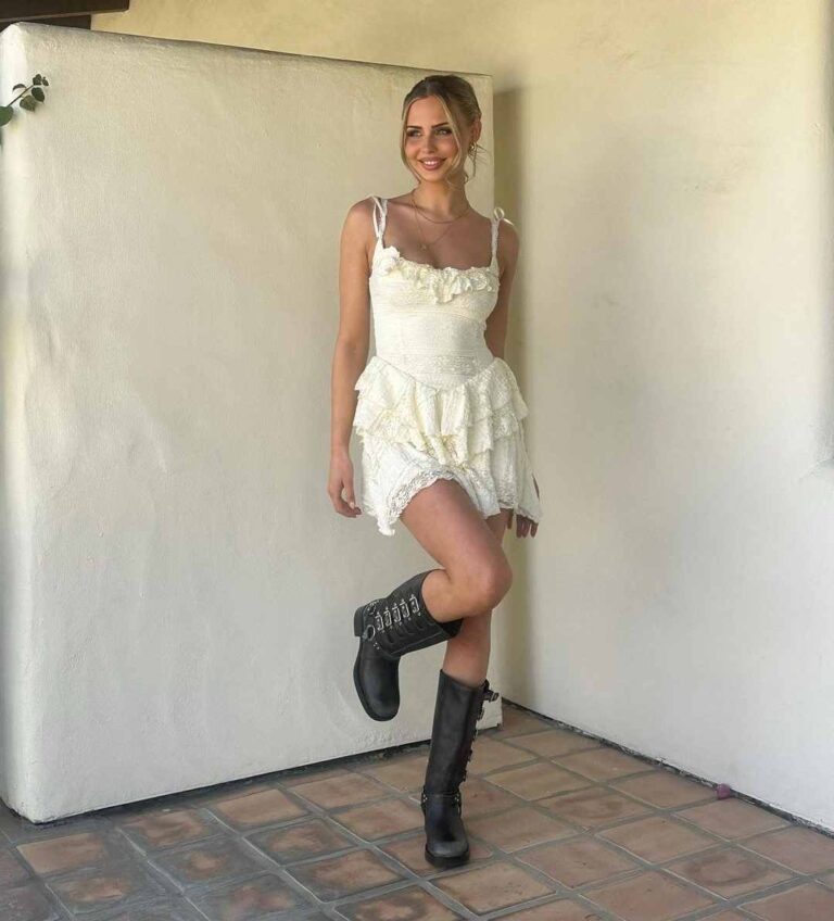 amanda wearing a white ruffled mini dress