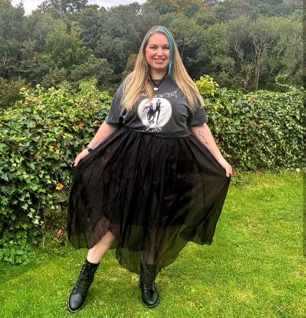 lisa wearing a Fleetwood Mac band t-shirt with a flowing black tulle maxi skirt