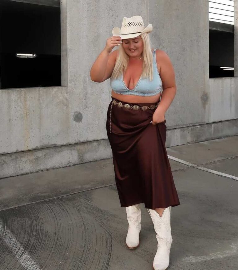 plus size girl wearing a light blue denim bralette with a brown midi skirt